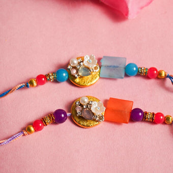 Pretty Orange & Blue Rakhi (Set of 2)