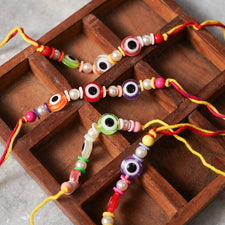 Elegant Evil Eye Rakhi Set Of 2