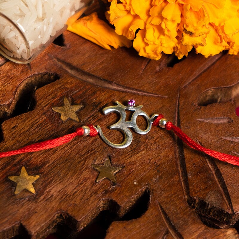 Buy 925 Silver Auspicious OM & Ruby Stone Rakhi Online in India ...
