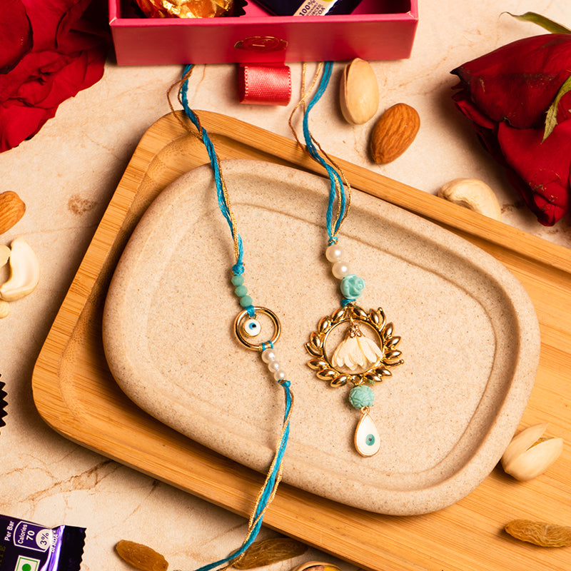 Delightful Evil Eye Bhaiya Bhabhi Rakhi Set