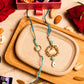 Delightful Evil Eye Bhaiya Bhabhi Rakhi Set