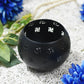 Round Black Decorative Candle Holder with Swastik Motifs