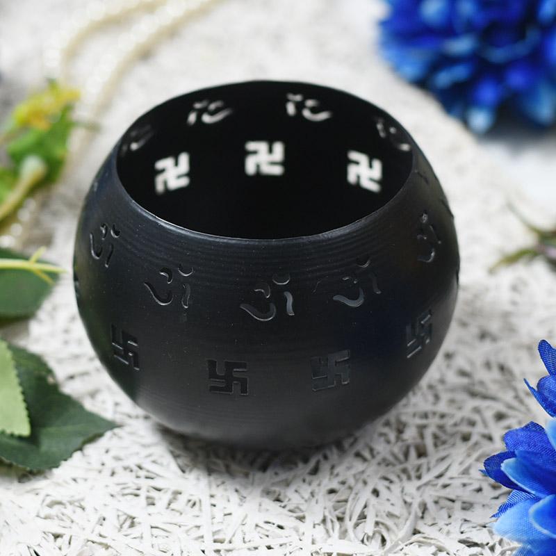 Round Black Decorative Candle Holder with Swastik Motifs