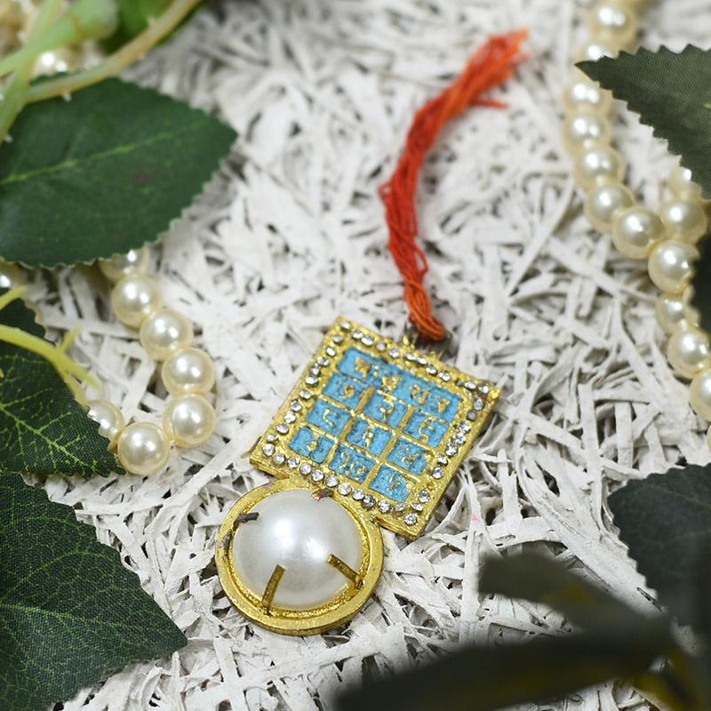 Stone-studded Chandra Yantra Pendant with White Pearl
