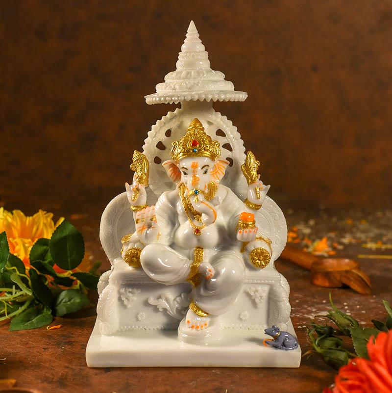 Divine Lord Ganesha On Singhasan Statue