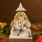 Divine Lord Ganesha On Singhasan Statue