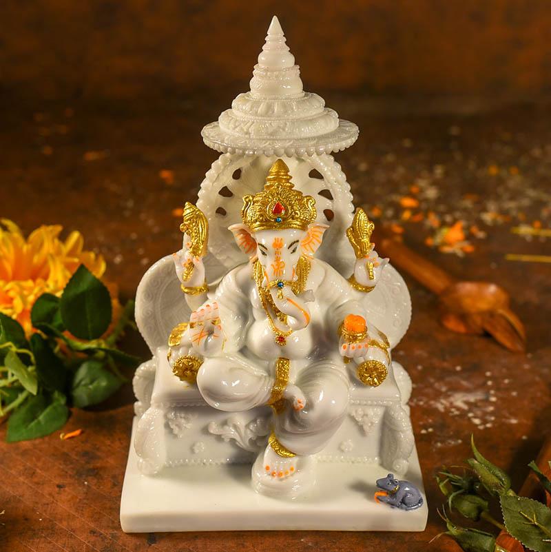 Divine Lord Ganesha On Singhasan Statue
