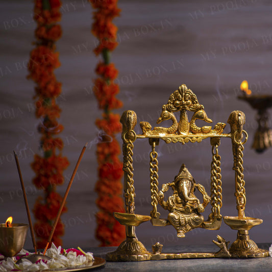 Traditional Brass Jhula Ganesha with Diya