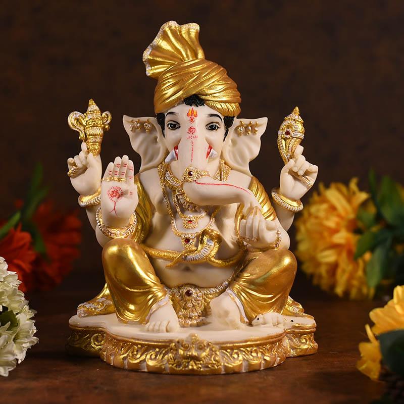 Divine Cream And Golden Sitting Ganesha
