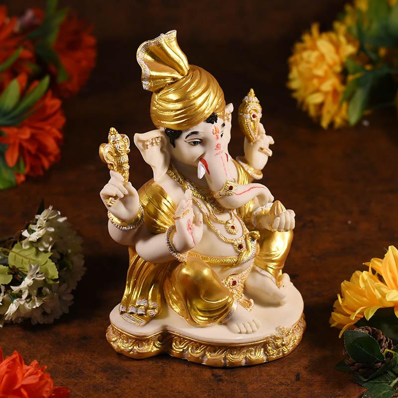 Divine Cream And Golden Sitting Ganesha