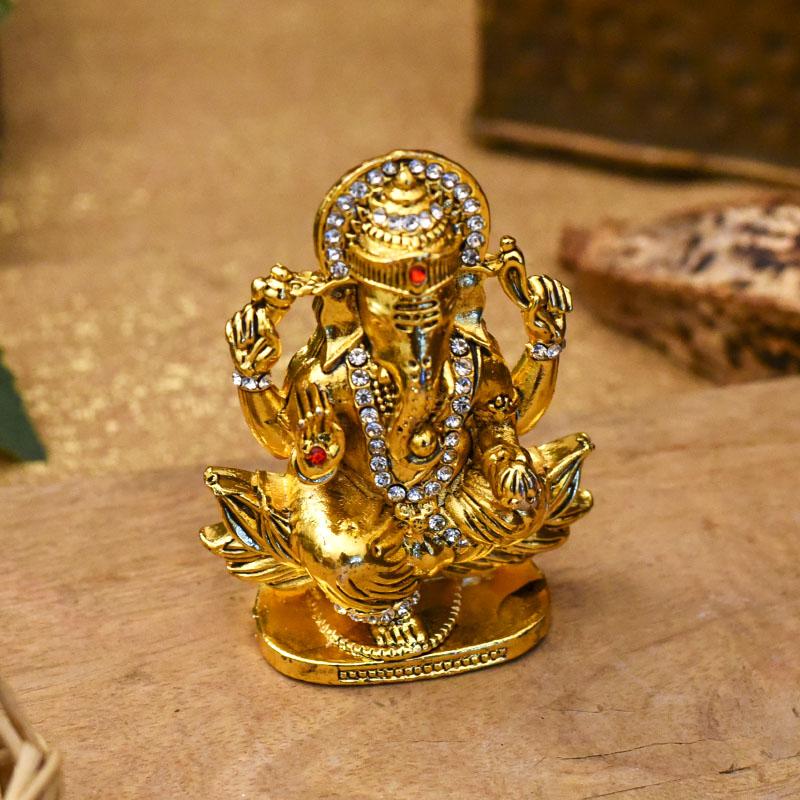 Golden Lord Ganesha Statue On Lotus