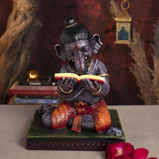 Deity Ganesha Reading Book Showpiece