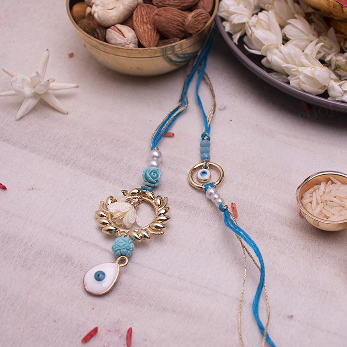 Delightful Evil Eye Bhaiya Bhabhi Rakhi Set