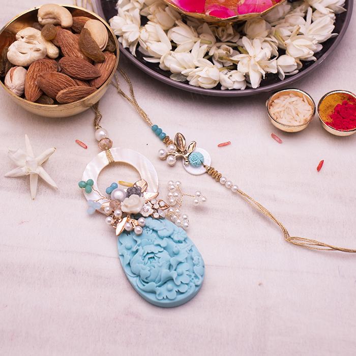Aqua Flower Bhaiya Bhabhi Rakhi Set