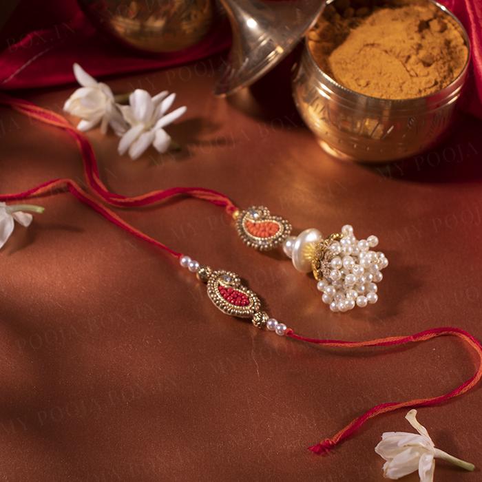 White & Orange Pearl Bhaiya Bhabhi Rakhi