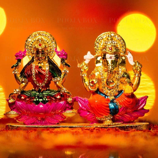 dazzling diamond studded laxmi ganesh murti on lotus