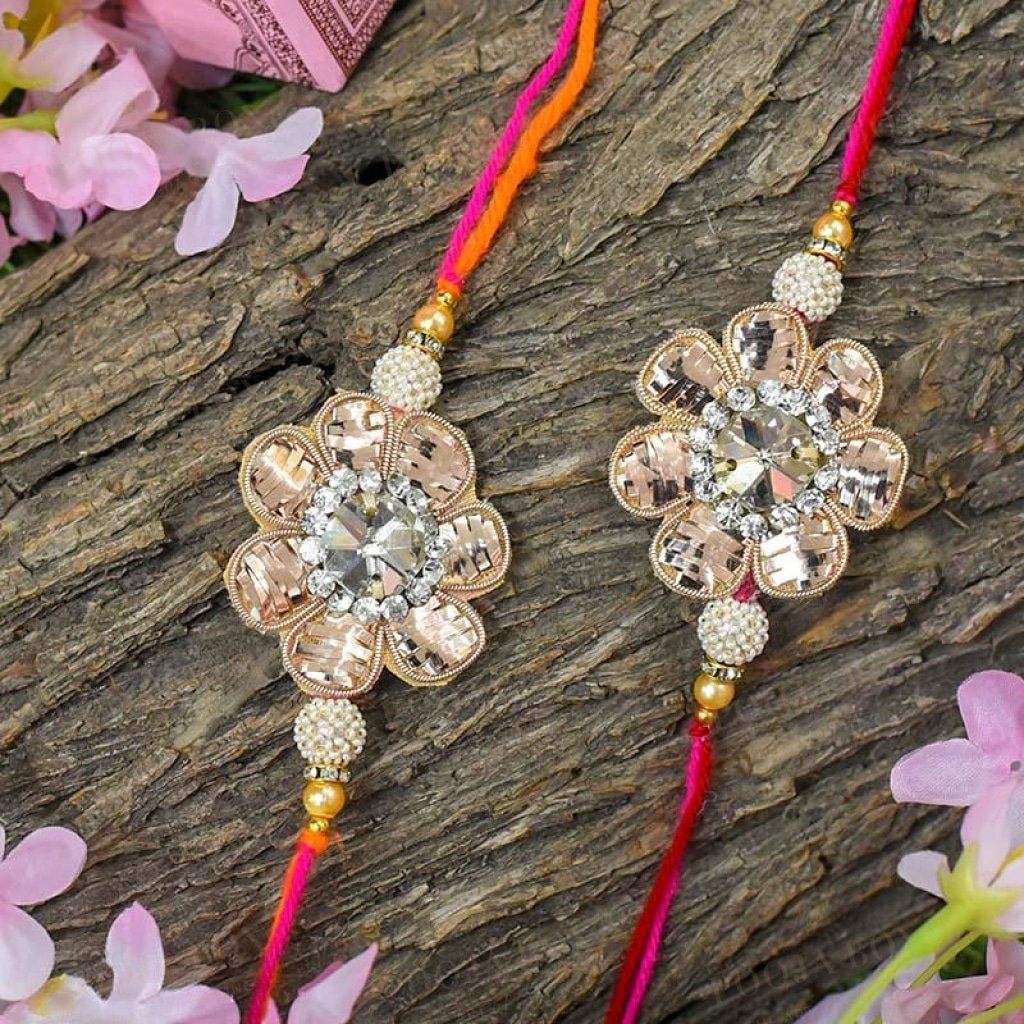 Elegant Zinnia Floral Rakhi Set Of 2