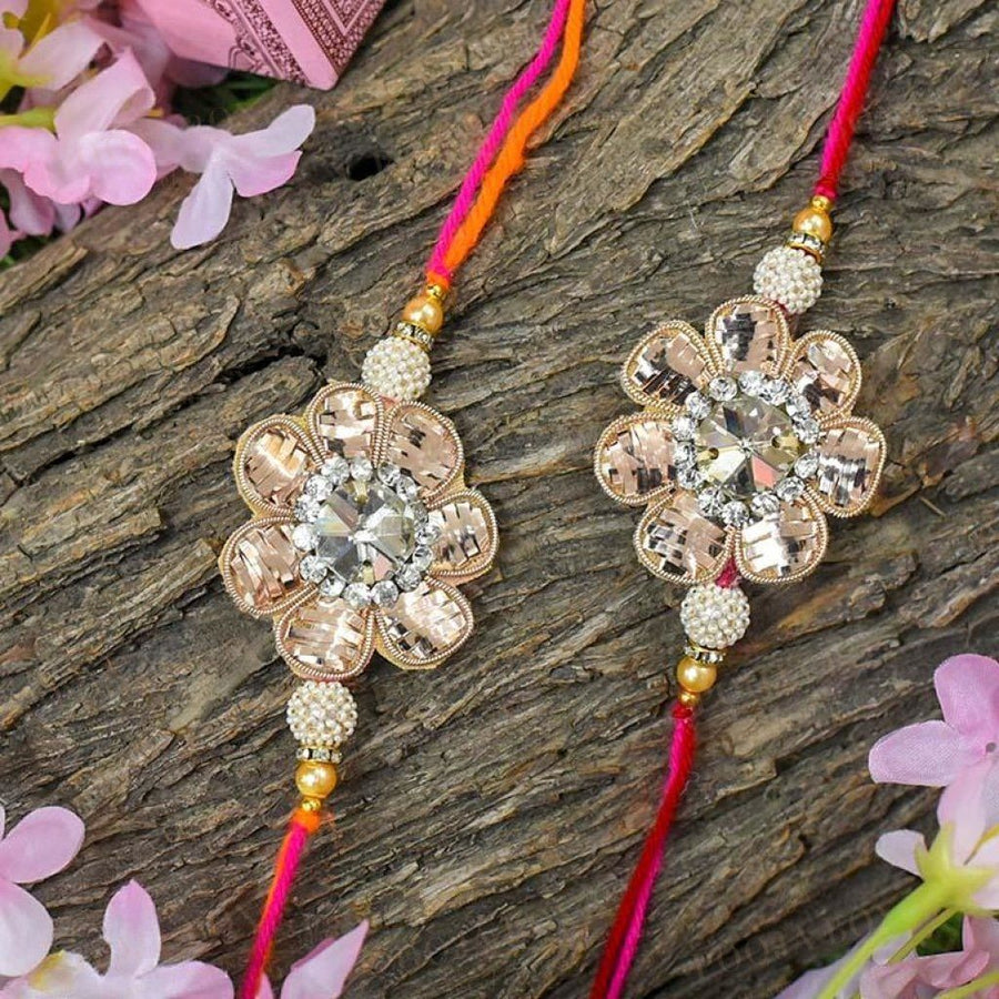Elegant Zinnia Floral Rakhi Set Of 2
