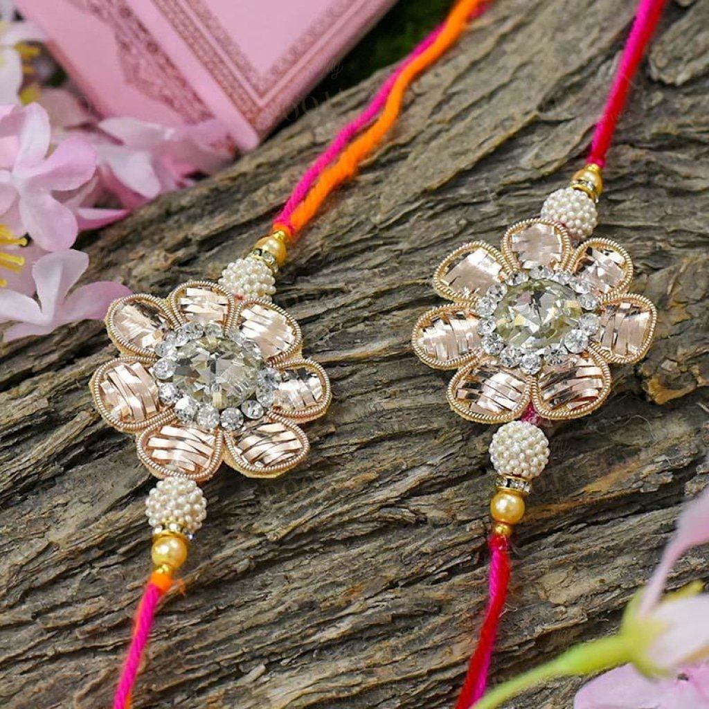 Elegant Zinnia Floral Rakhi Set Of 2