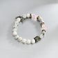 Howlite & Rose Quartz Bracelet With Buddha And Angel Wings