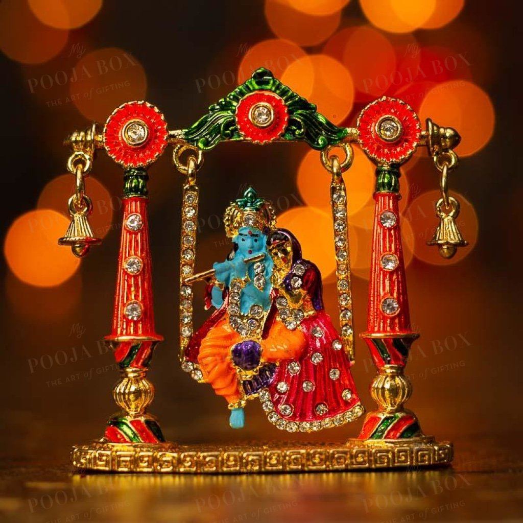 Vibrant Radha Krishna Idol With Jhula Idols